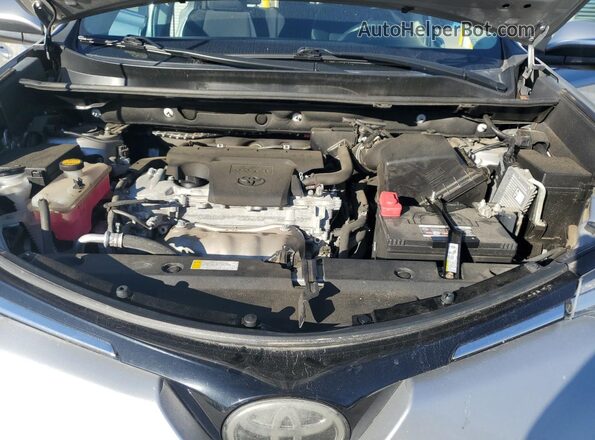 2T3WFREV6JW488899 2018 TOYOTA RAV4 Silver Սալոնի հետևի տեսք