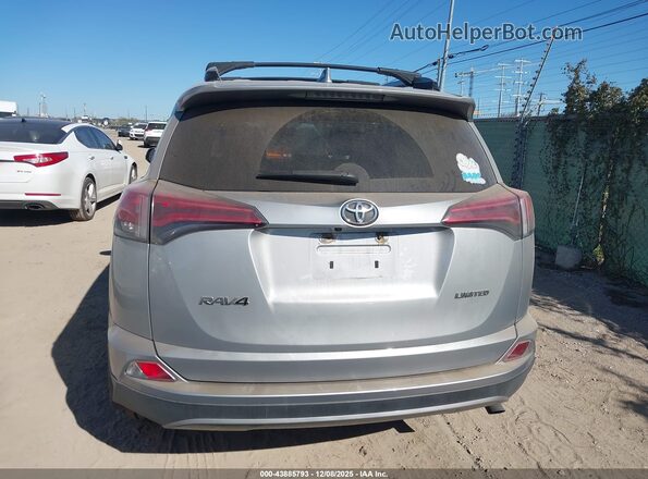 2T3YFREV9JW457655 2018 TOYOTA LIMITED Silver 