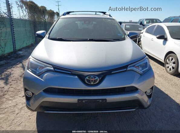 2T3YFREV9JW457655 2018 TOYOTA LIMITED Silver 