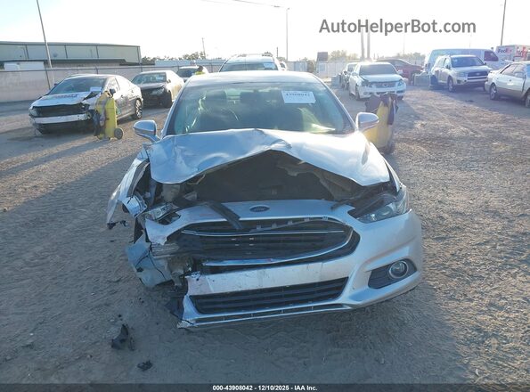 3FA6P0LU3GR190980 2016 FORD FUSION HYBRID Silver Widok wnętrza z tyłu