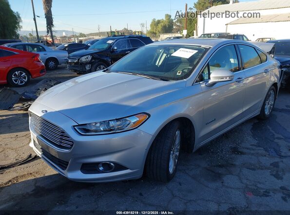 3FA6P0LU4GR173203 2016 FORD FUSION HYBRID Silver Vista tres cuartos delantera izquierda