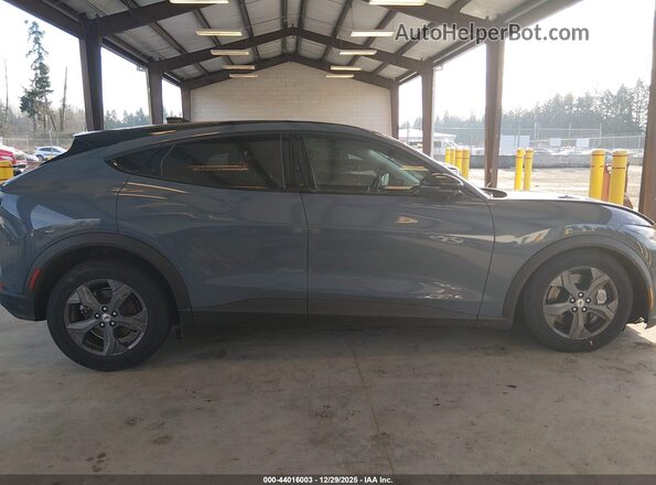 3FMTK1S54PMB00983 2023 FORD MUSTANG MACH-E Blue Սալոնի հետևի տեսք