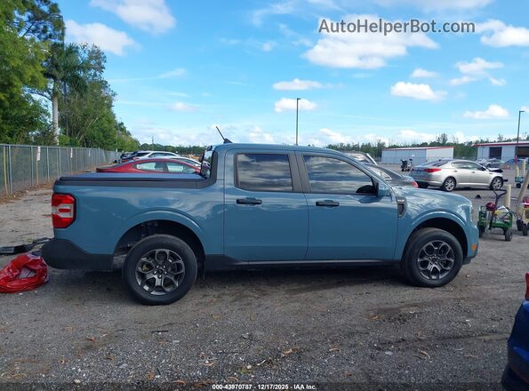 3FTTW8E37NRA28107 2022 FORD MAVERICK Blue Вид задньої частини салону