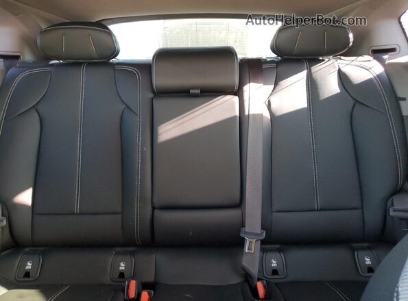 3GYK3EMR8SS248511 2025 CADILLAC OPTIQ Красный Вид задних сидений