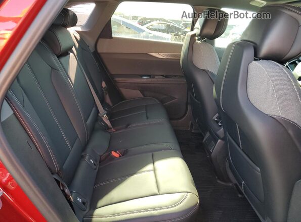 3GYK3EMR8SS248511 2025 CADILLAC OPTIQ Красный Вид задней части салона