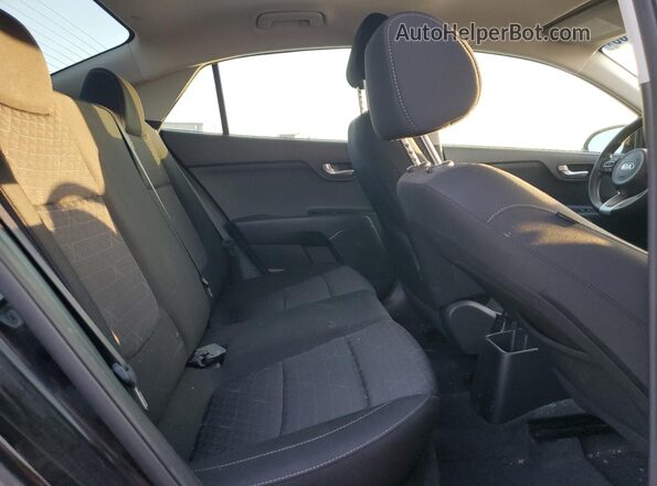 3KPA24AD1LE334878 2020 KIA RIO Black Vista de los asientos traseros