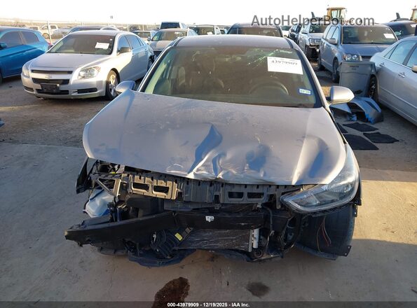 3KPC24A6XNE155476 2022 HYUNDAI ACCENT Серебряный Вид задней части салона