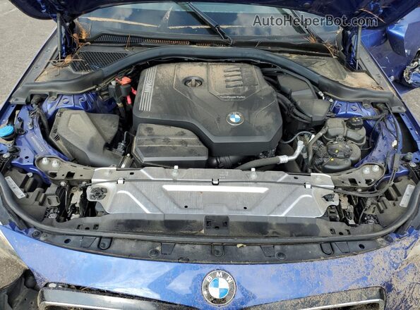 3MW23CM09P8D11774 2023 BMW 2 SERIES Blue Սալոնի հետևի տեսք