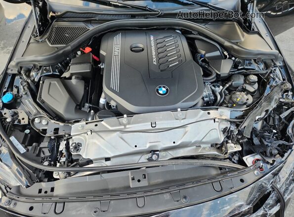 3MW43CM08P8D25836 2023 BMW M2 Black Vista interior trasera