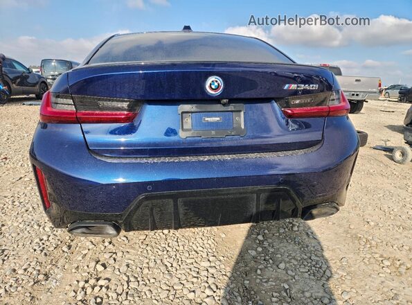 3MW49FF05P8C80349 2023 BMW M3 Blue უკანა ხედი