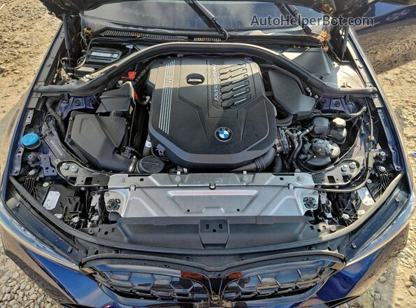 3MW49FF05P8C80349 2023 BMW M3 Blue უკანა სალონის ხედი