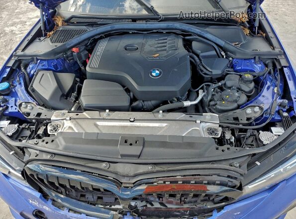 3MW5R7J06N8C76227 2022 BMW 3 SERIES Blue Rear interior view