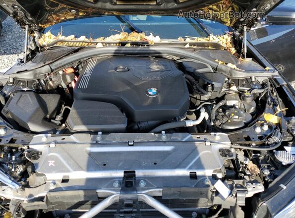 3MW5R7J07N8C36500 2022 BMW 3 SERIES Black Vista interior trasera