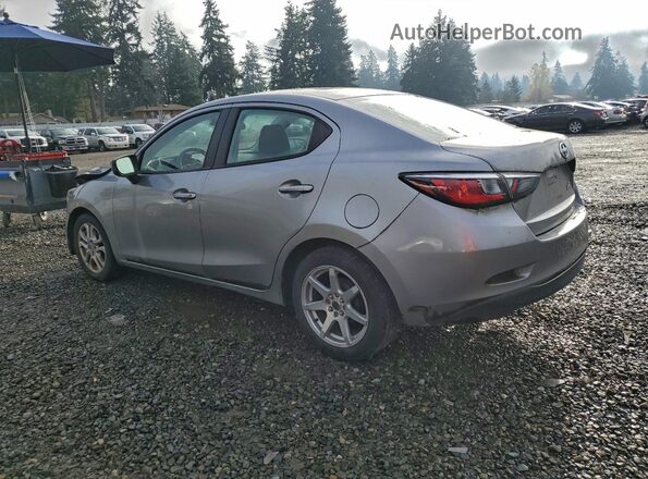 3MYDLBZV0GY102242 2016 TOYOTA SCION Silver უკანა მარცხენა