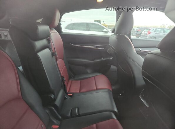 3PCAJ5LR3PF101554 2023 INFINITI QX55 Red Rear seats view