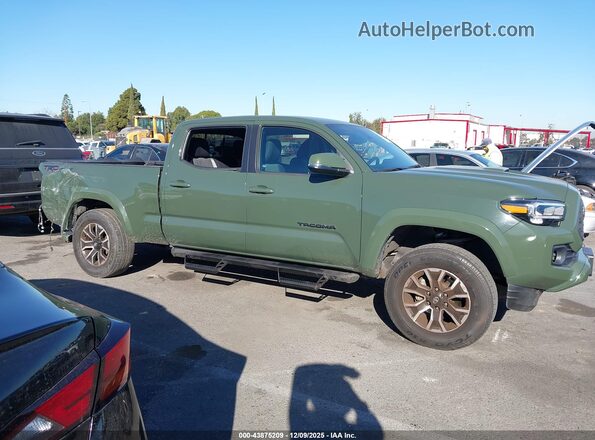 3TMBZ5DN7NM033907 2022 TOYOTA TACOMA Green Widok wnętrza z tyłu