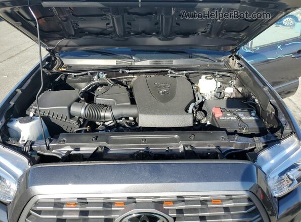3TYCZ5AN2PT175064 2023 TOYOTA LE Charcoal უკანა სალონის ხედი