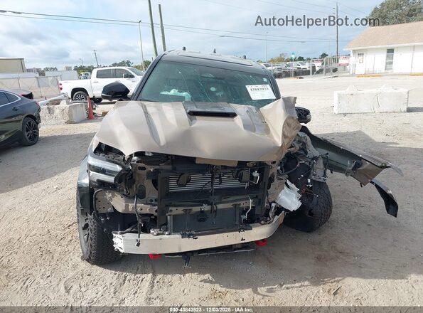 3TYLC5LNXST018633 2025 TOYOTA TACOMA HYBRID Brown ხელსაწყოთა პანელის ხედი