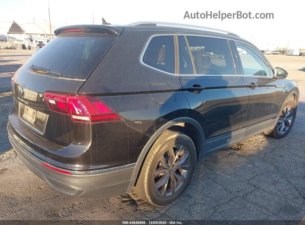 3VV3B7AX2NM128063 2022 VOLKSWAGEN TIGUAN Black Front view