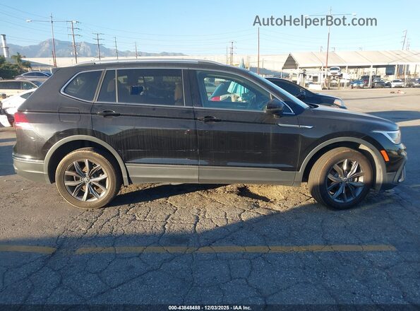 3VV3B7AX2NM128063 2022 VOLKSWAGEN TIGUAN Black Rear interior view