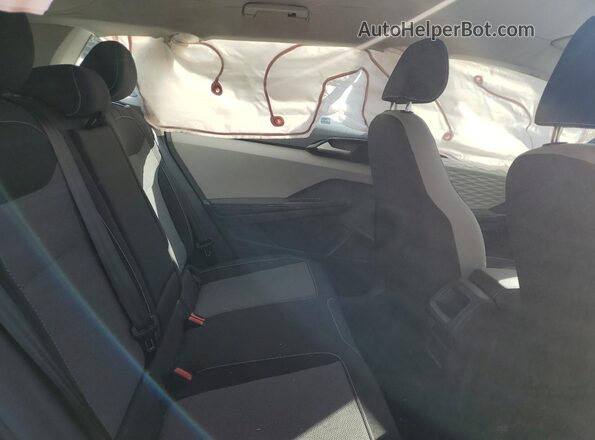 3VV5X7B25RM103404 2024 VOLKSWAGEN TAOS Black Вид задньої частини салону