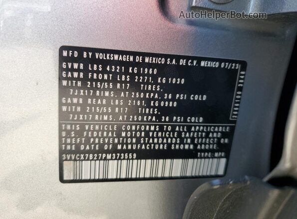 3VVCX7B27PM373559 2023 VOLKSWAGEN TAOS Silver VIN sticker view