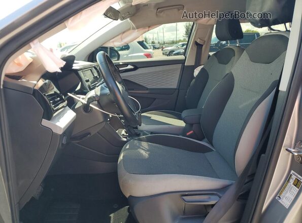 3VVCX7B27PM373559 2023 VOLKSWAGEN TAOS Silver Front interior view