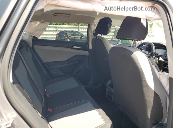 3VVCX7B27PM373559 2023 VOLKSWAGEN TAOS Silver Rear interior view