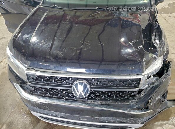 3VVDX7B26PM382676 2023 VOLKSWAGEN TAOS Черный Вид подкапотного пространства