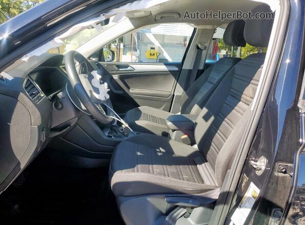 3VVRB7AX7RM066689 2024 VOLKSWAGEN TIGUAN Black Vista interior delantera