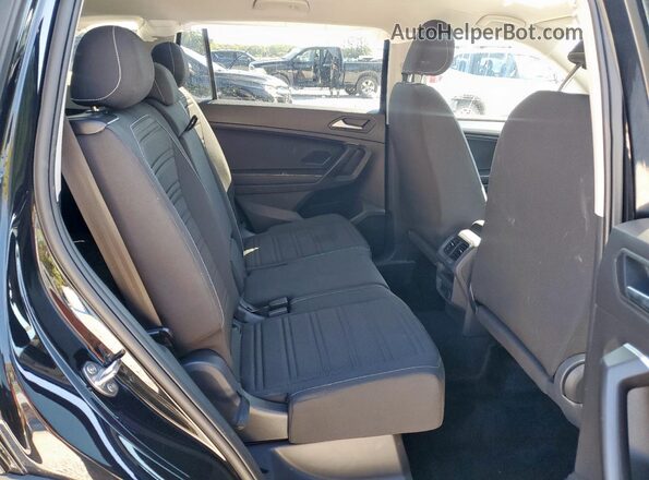 3VVRB7AX7RM066689 2024 VOLKSWAGEN TIGUAN Black Vista interior trasera