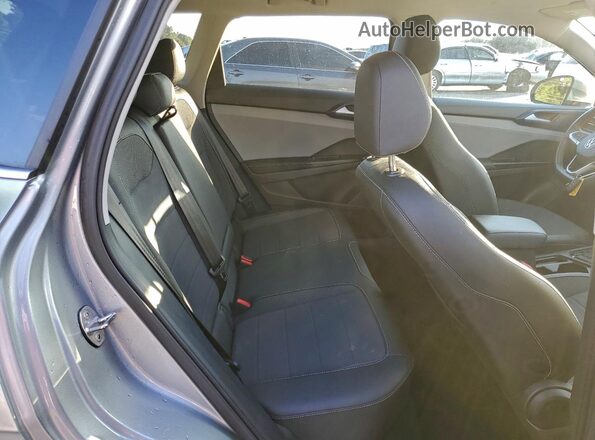 3VVSX7B28RM018477 2024 VOLKSWAGEN TAOS Silver Rear interior view