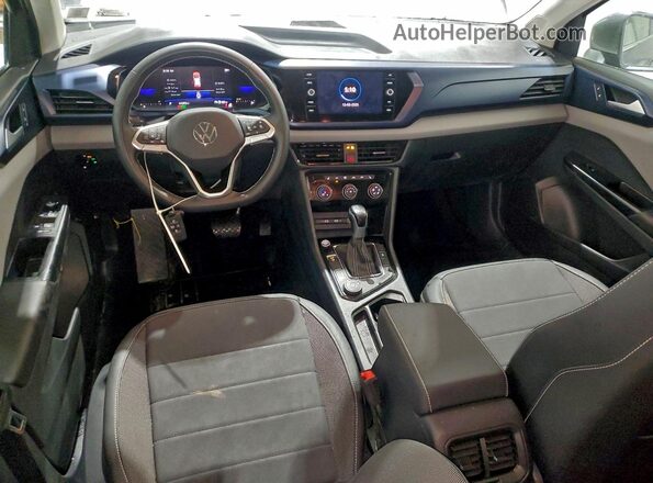 3VVUX7B24PM357906 2023 VOLKSWAGEN TAOS Серебряный Вид панели приборов