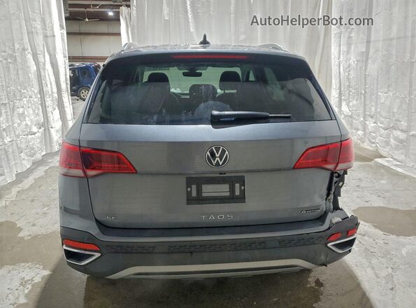 3VVUX7B24PM357906 2023 VOLKSWAGEN TAOS Серебряный Вид сзади