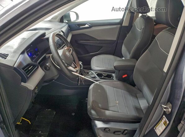 3VVUX7B24PM357906 2023 VOLKSWAGEN TAOS Серебряный Вид салона спереди