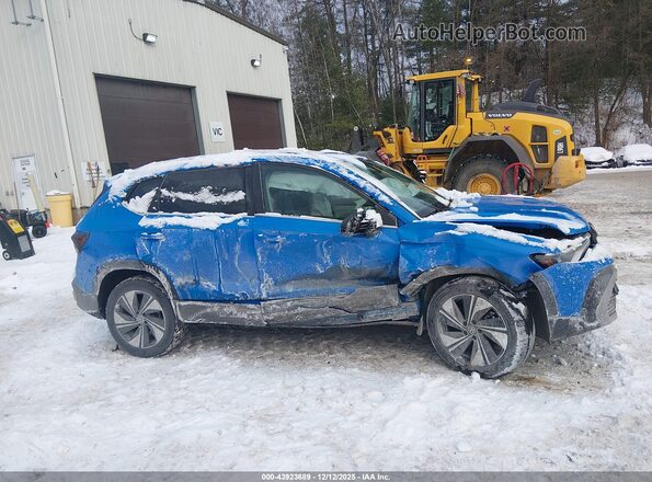 3VVVC7B20SM060141 2025 VOLKSWAGEN TAOS Blue Vista interior trasera