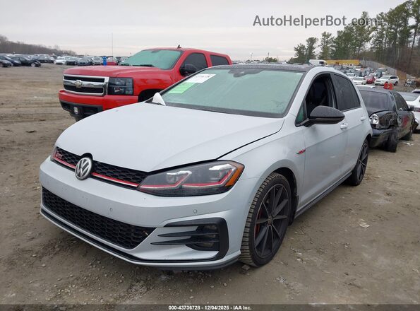 3VW6T7AU5MM005299 2021 VOLKSWAGEN GOLF Gray Vista tres cuartos delantera izquierda