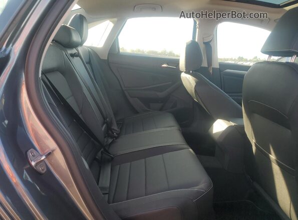 3VW7M7BU2RM078590 2024 VOLKSWAGEN JETTA Gray Vista de los asientos traseros