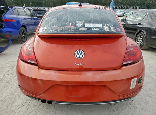 3VWJ17AT1HM617657 2017 VOLKSWAGEN BEETLE Оранжевый Вид сзади