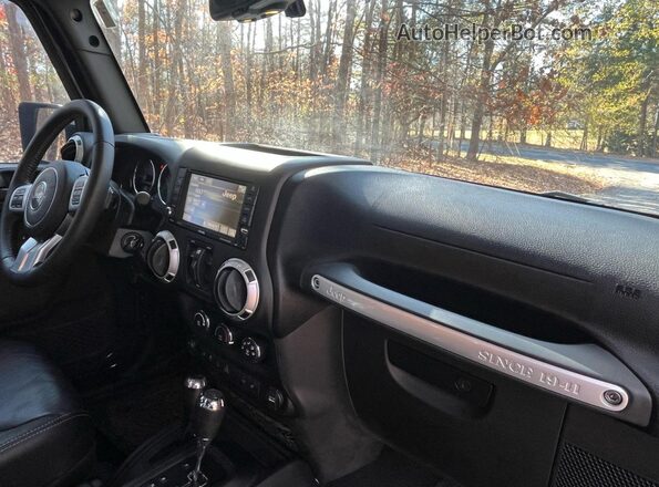 1C4BJWFG8GL269885 2016 JEEP WRANGLER Gray Vista de los asientos traseros