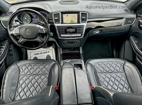 4JGDF7DE3GA639794 2016 MERCEDES-BENZ GL-CLASS Black Rear seats view