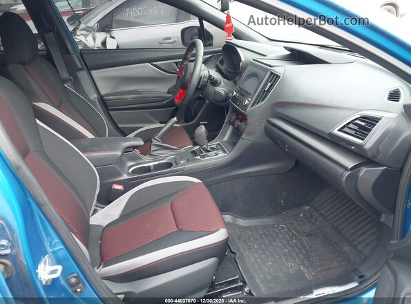 4S3GKAM60P3602564 2023 SUBARU IMPREZA Blue Vista interior delantera