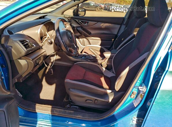 4S3GTAM60M3707274 2021 SUBARU IMPREZA Blue Front interior view