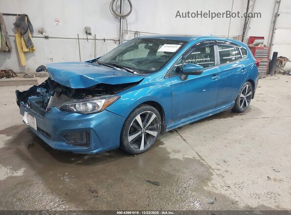4S3GTAM65J3720291 2018 SUBARU IMPREZA Blue 