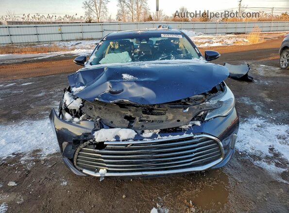 4T1BD1EB7JU063065 2018 TOYOTA AVALON Blue Widok z przodu