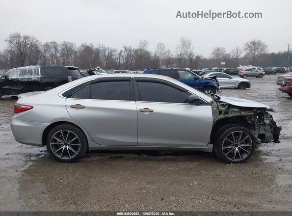 4T1BF1FK6HU694036 2017 TOYOTA LE Silver Вид задньої частини салону