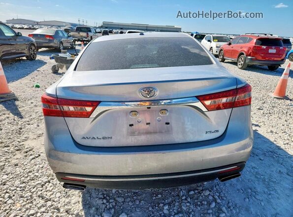 4T1BK1EB4GU238712 2016 TOYOTA LE Серебряный Вид сзади