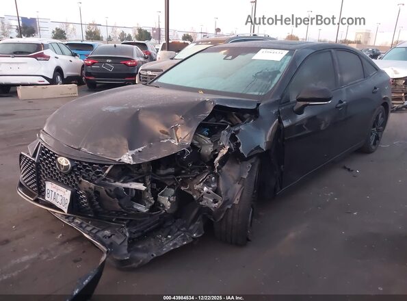 4T1EZ1FB5MU057637 2021 TOYOTA AVALON Black Front left
