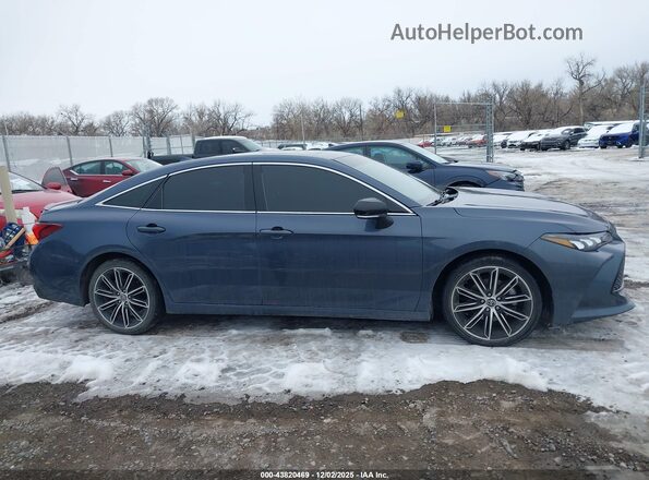 4T1EZ1FB7LU046170 2020 TOYOTA AVALON Серый Вид задней части салона