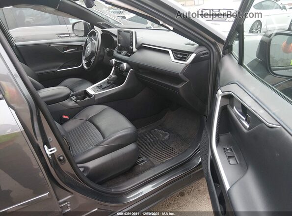 4T3E6RFV0MU057196 2021 TOYOTA RAV4 HYBRID Gray Widok wnętrza z przodu